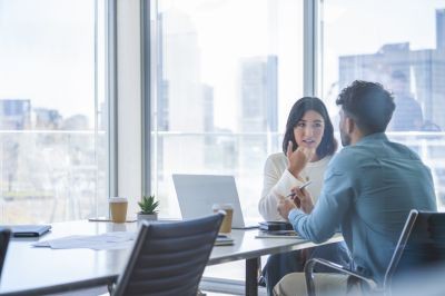 Business-woman-and-man-meeting-and-talking